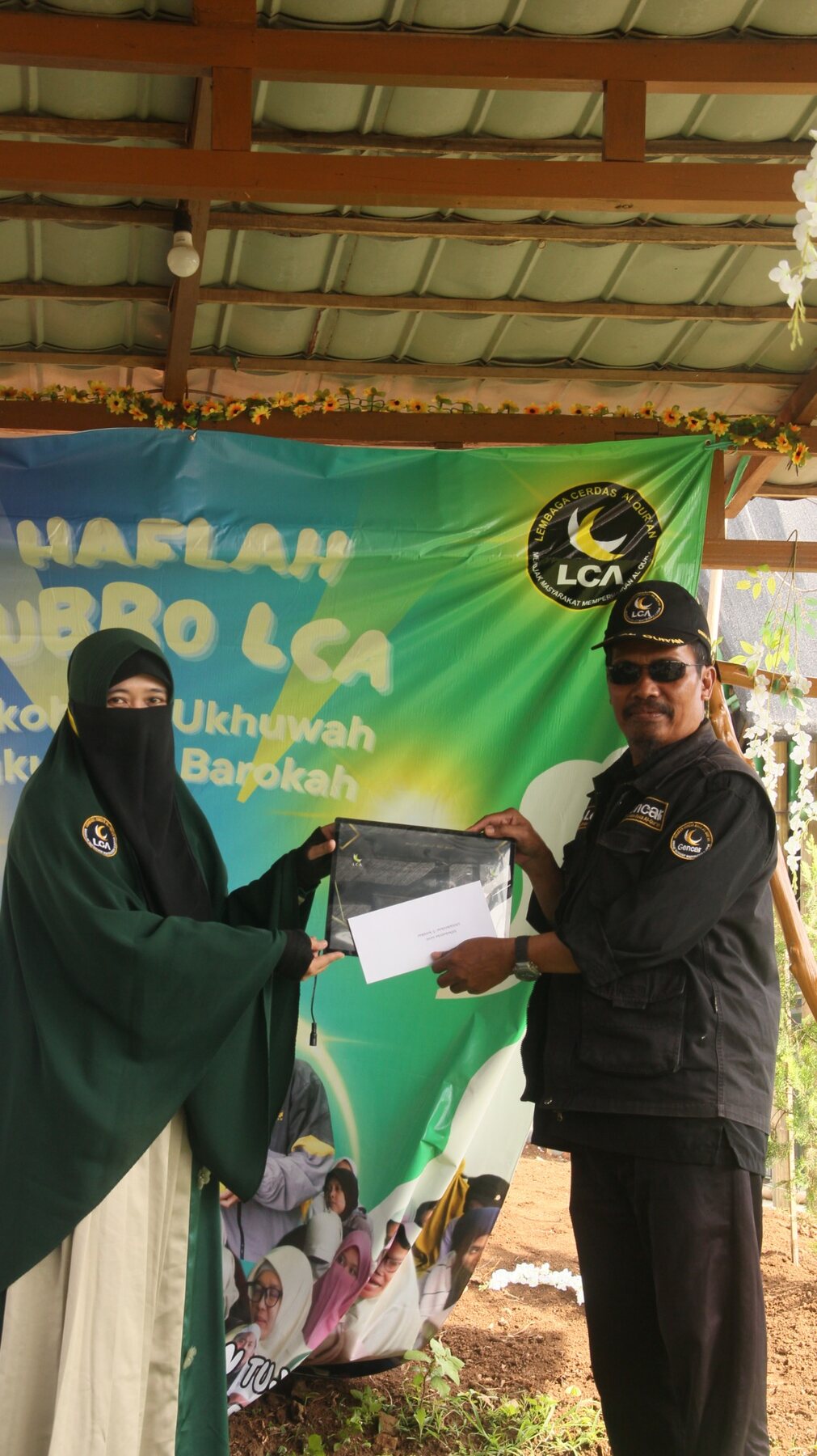 Penyerahan dukungan kepada guru ngaji